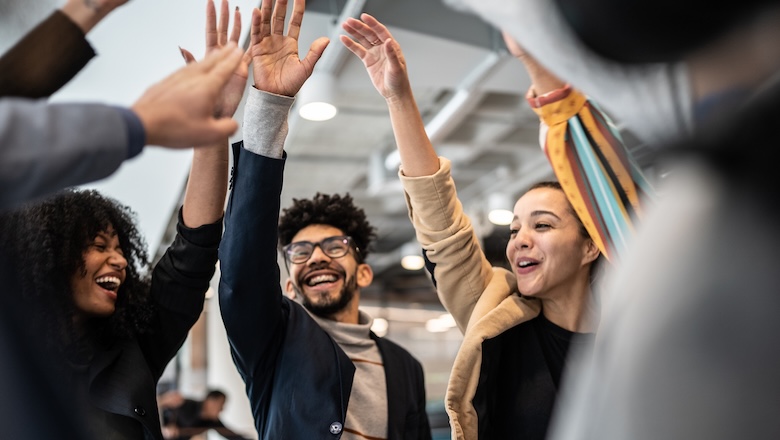 Coworkers celebrating at the office