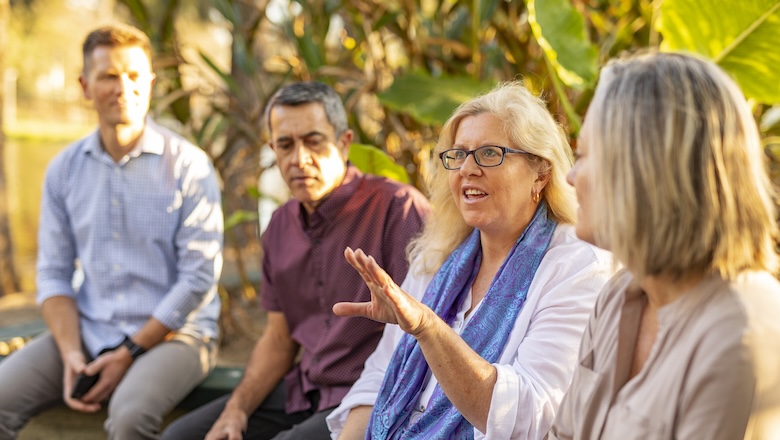 People sharing stories in a group